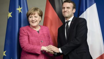 German Chancellor Angela Merkel welcomes French President Emmanuel Macron